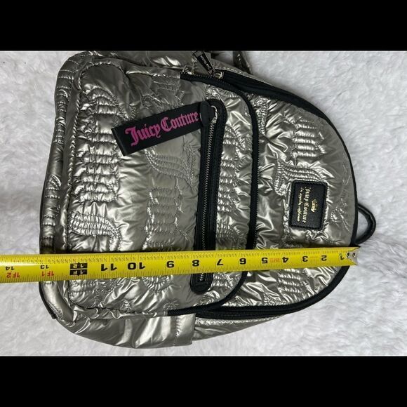 Juicy Couture Metallic quilted silver Backpack with black trim. - Picture 8 of 16
